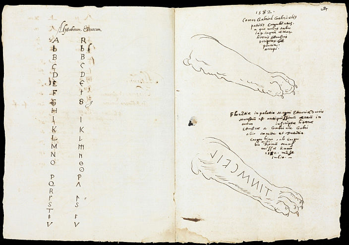 Fig. 5. Manuscript with pen and ink drawings by Alfonso Chacón (1540–1599): facing page, Latin and Etruscan alphabets; recto, right foreleg of the Chimaera of Arezzo with retrograde Etruscan inscription, 28 x 41 cm, 1582. Los Angeles, Research Library, the Getty Research Institute, inv. no. 840005B.